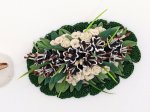 (image for) Black Lily Centerpiece on White Doily